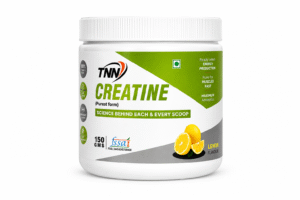 “TNN Creatine Lemon Flavour supplement jar placed on a white background, featuring green and grey label design with bold ‘CREATINE’ text, lemon graphics, and fitness performance claims.