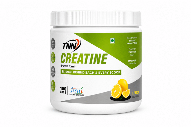 “TNN Creatine Lemon Flavour supplement jar placed on a white background, featuring green and grey label design with bold ‘CREATINE’ text, lemon graphics, and fitness performance claims.