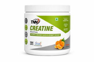 “TNN Creatine Lemon Flavour supplement jar placed on a white background, featuring green and grey label design with bold ‘CREATINE’ text, lemon graphics, and fitness performance claims.